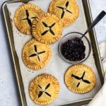 Mini Blueberry Hand Pies made with pie crust and homemade blueberry jam is a perfect treat for breakfast or dessert.