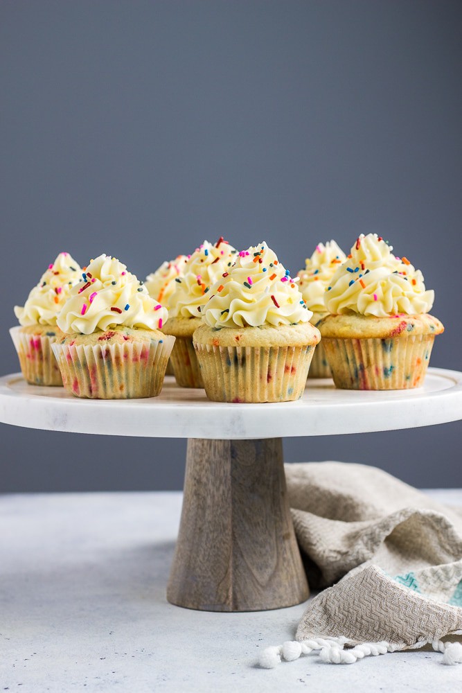 Birthday Cake Funfetti Cupcakes topped with delicious vanilla buttercream frosting and lots of sprinkles! 