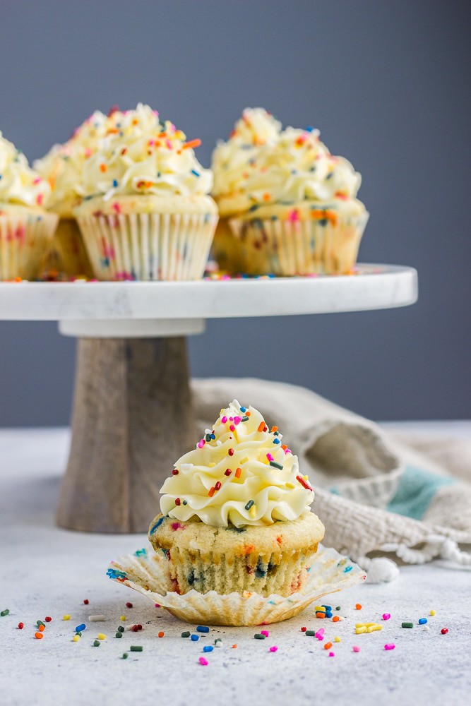 Birthday Cake Funfetti Cupcakes topped with delicious vanilla buttercream frosting and lots of sprinkles! 