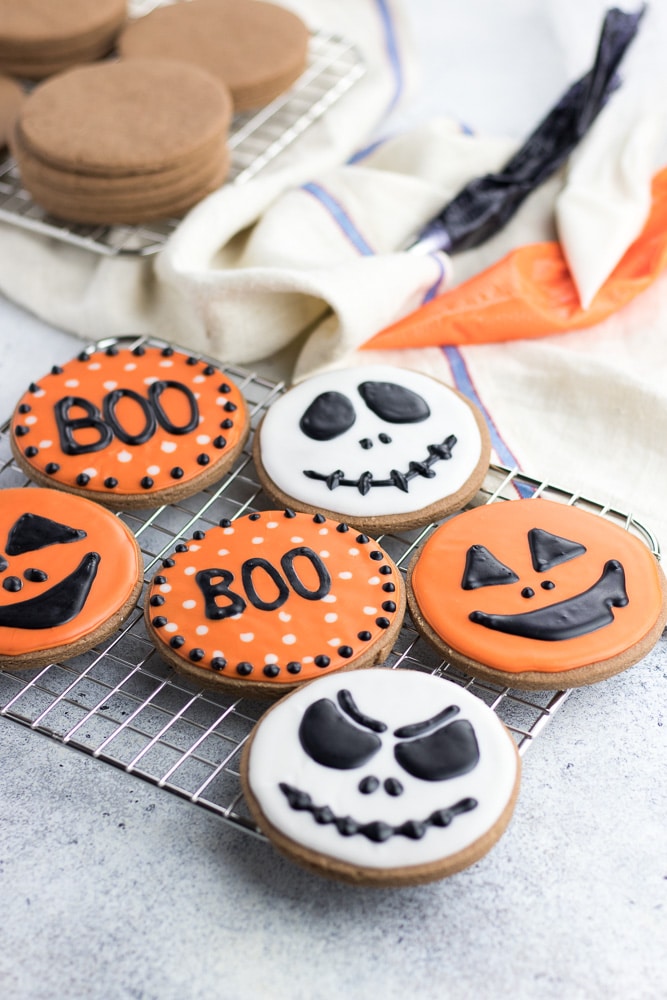Halloween Chocolate Sugar Cookies are classic soft cut out sugar cookies made with cocoa powder and decorated with easy sugar icing!