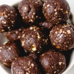 Brownie bites in a white bowl.