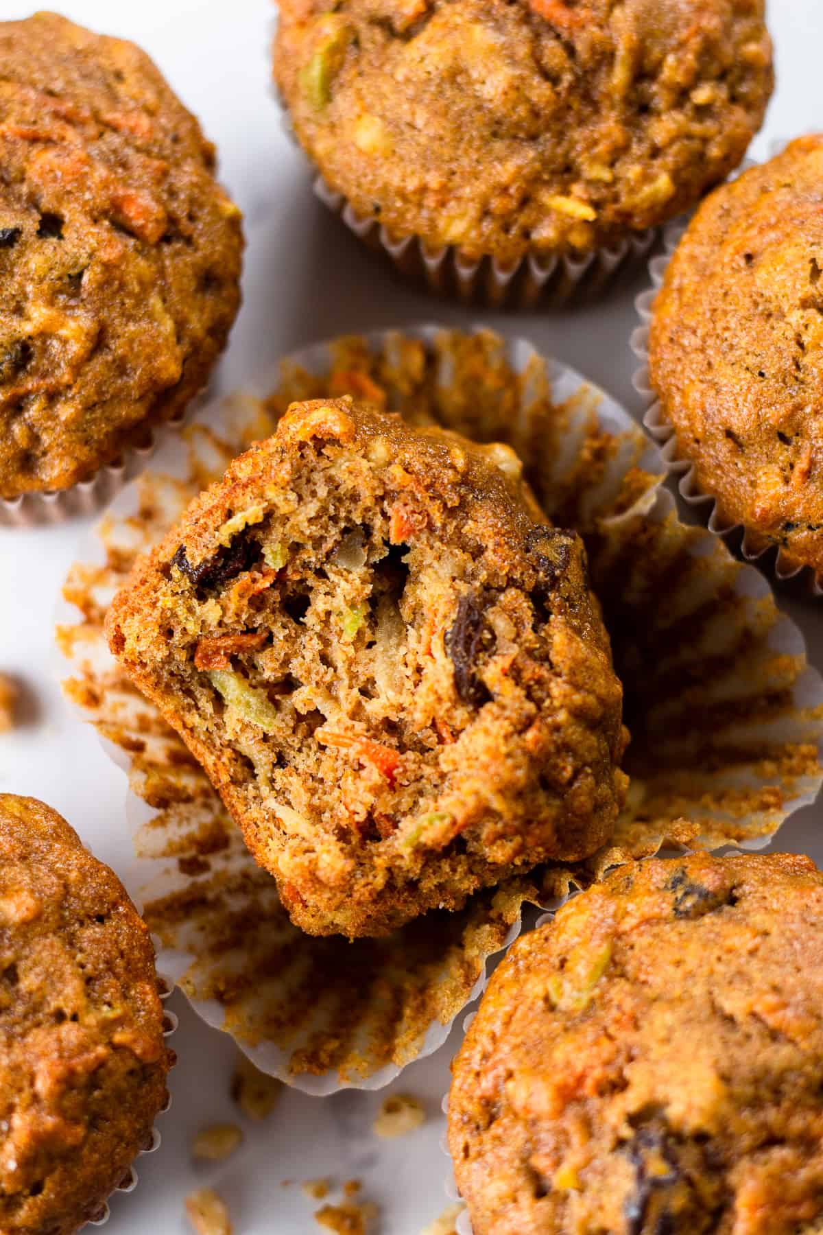 Morning Glory Muffins on a white table.