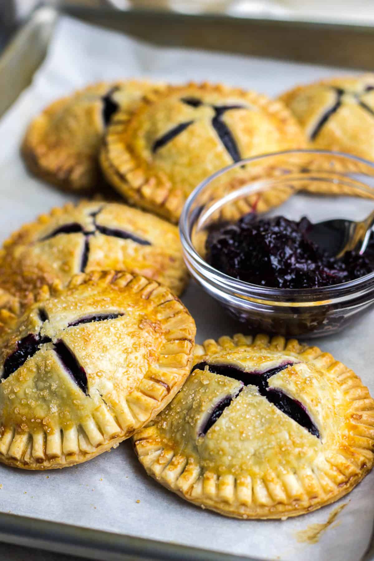 Blueberry hand pied on a baking pan.