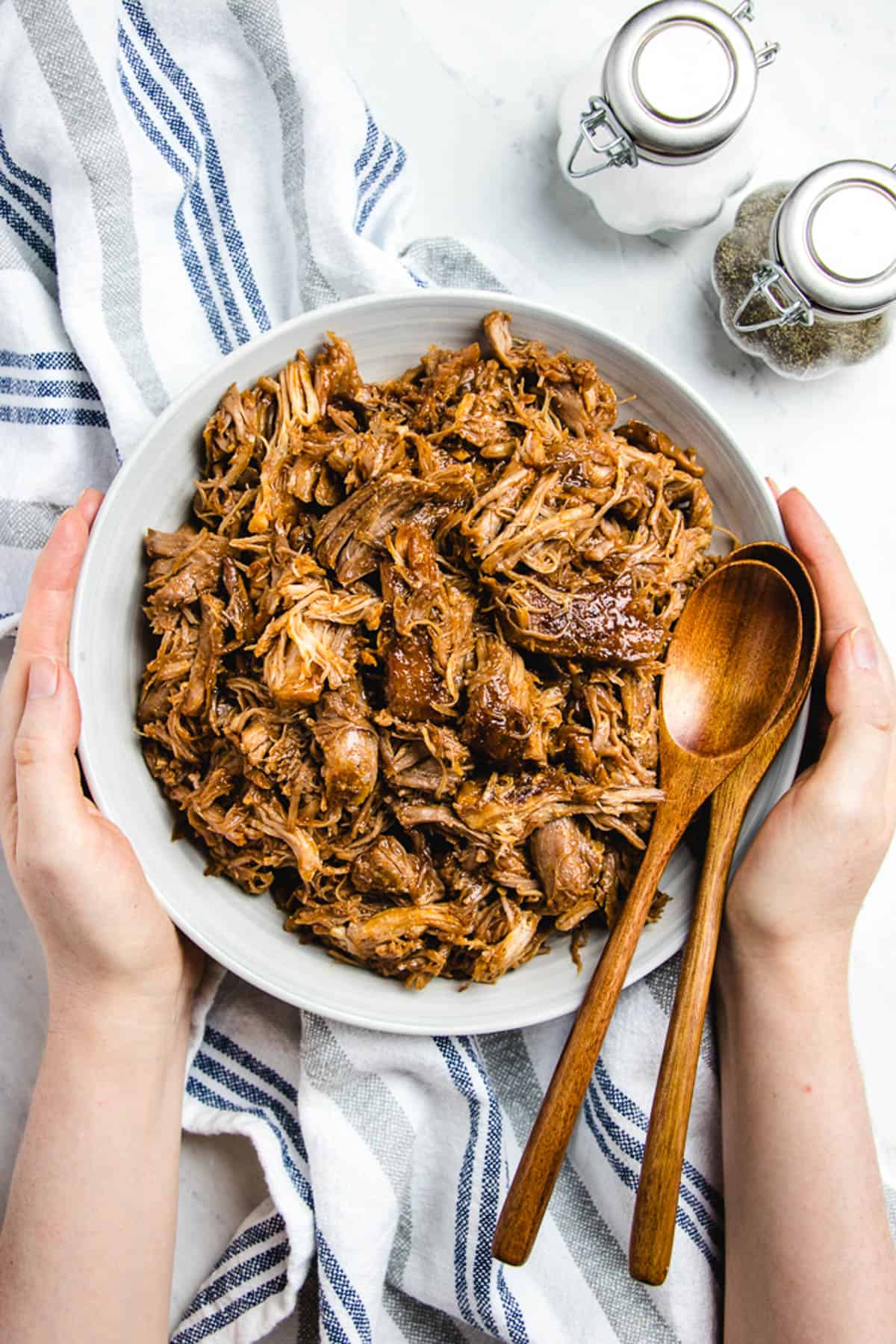 BBQ Pulled Pork in a bowl on a table.