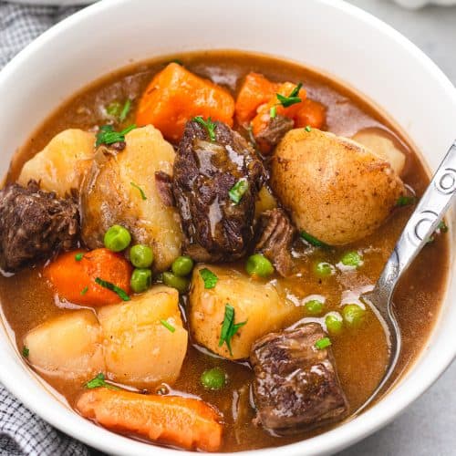 Beed Stew with a spoon on a white bowl.