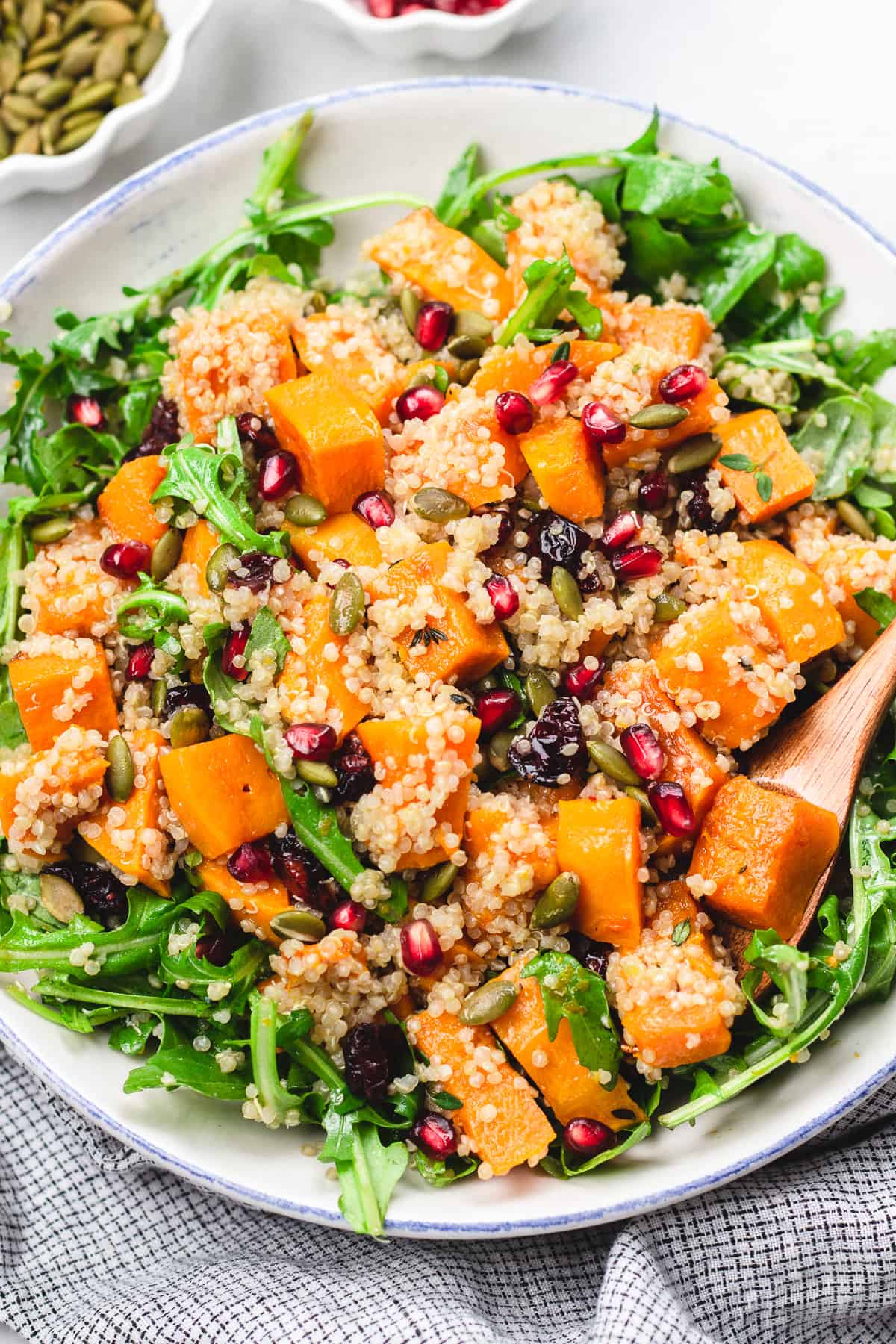 Butternut Squash Quinoa Salad in a white bowl.