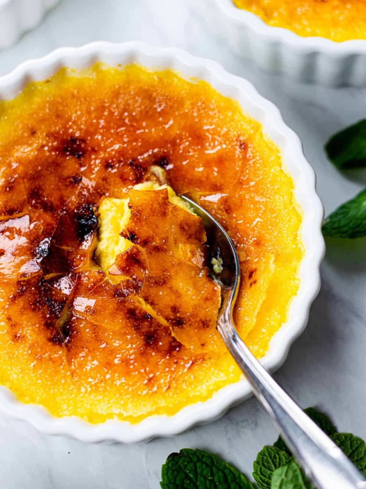 Classic Creme Brulee in white ramekins.