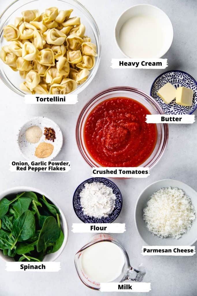 Ingredients for tortellini in tomato sauce.
