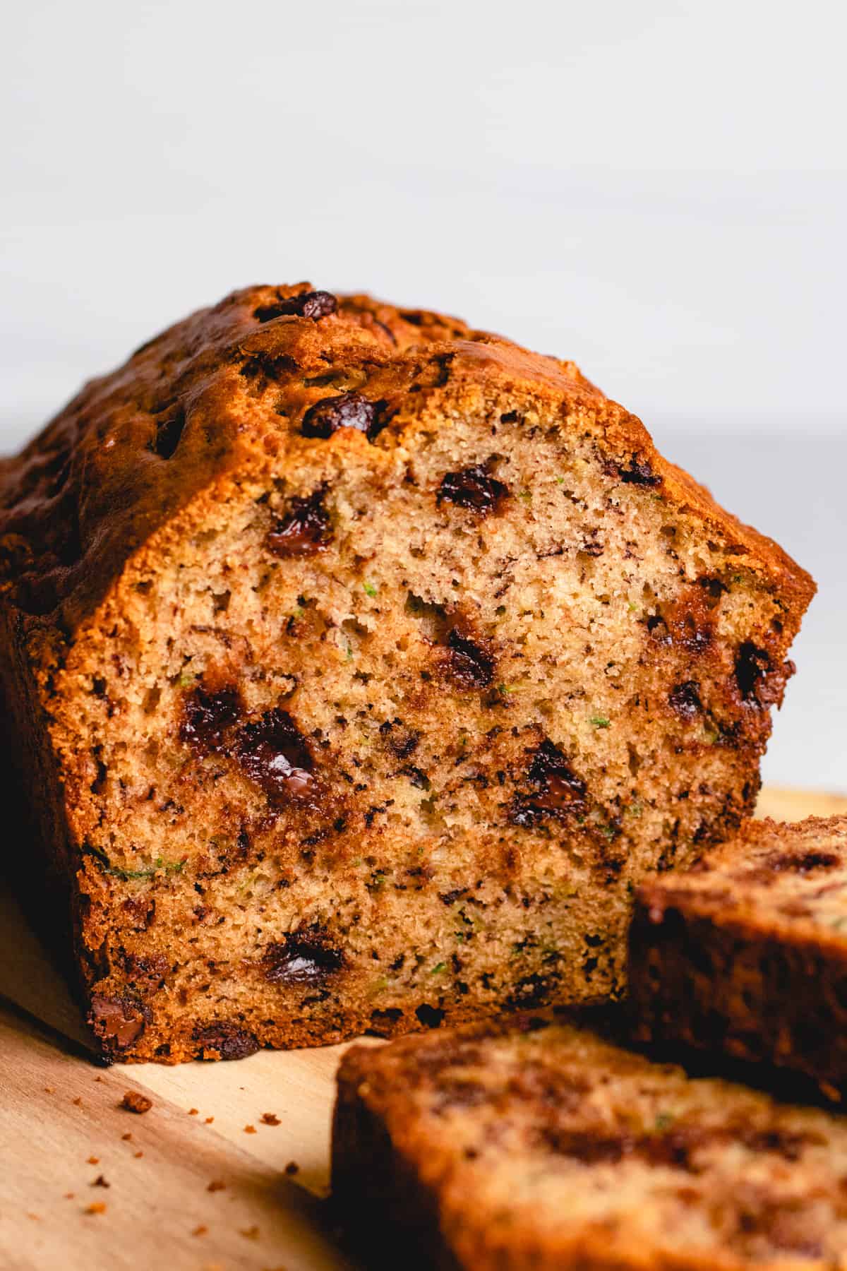 Sliced zucchini banana bread with chocolate chips.