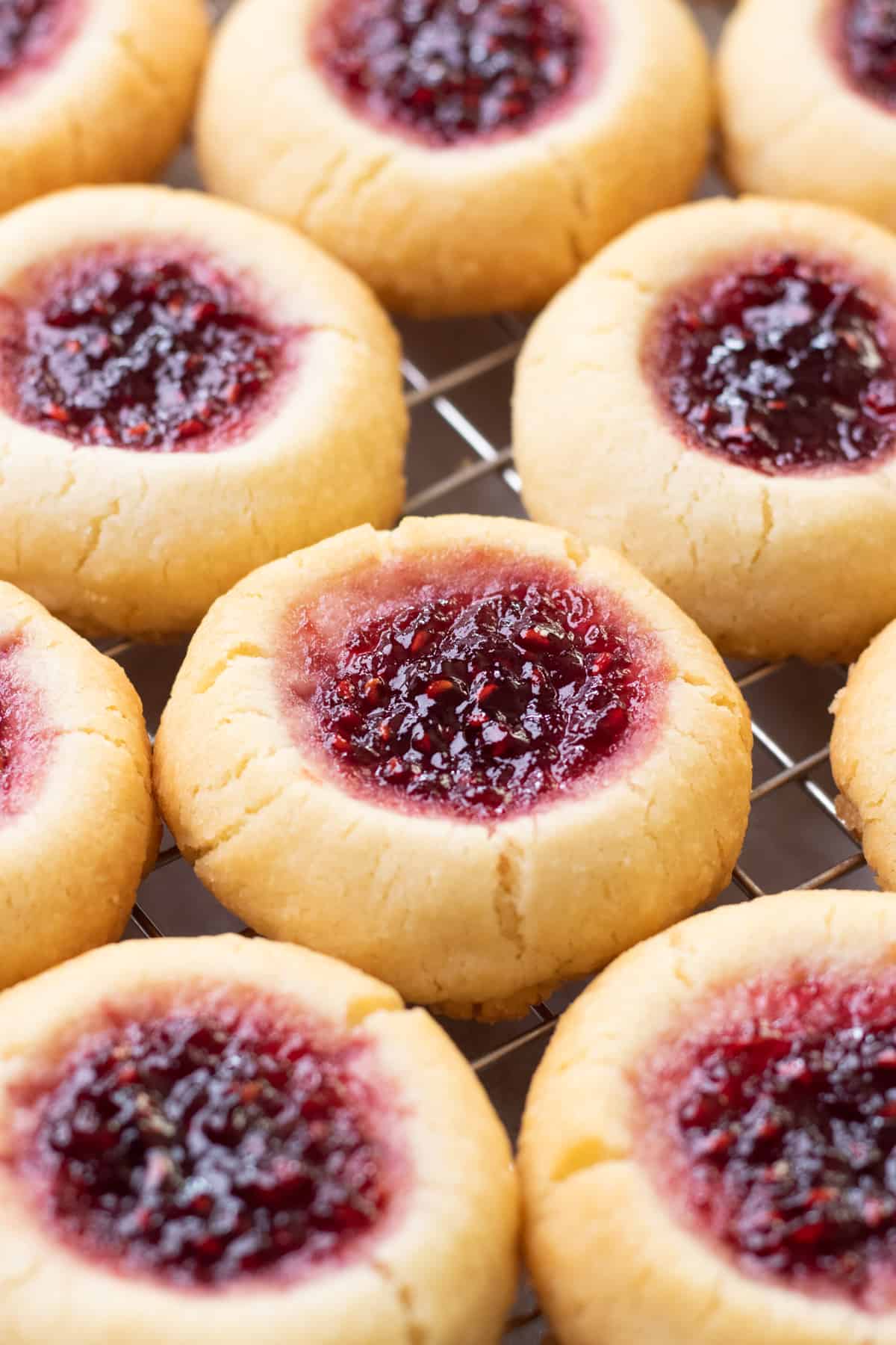 Close up photo of Raspberry Almond Thumbprint Cookies.