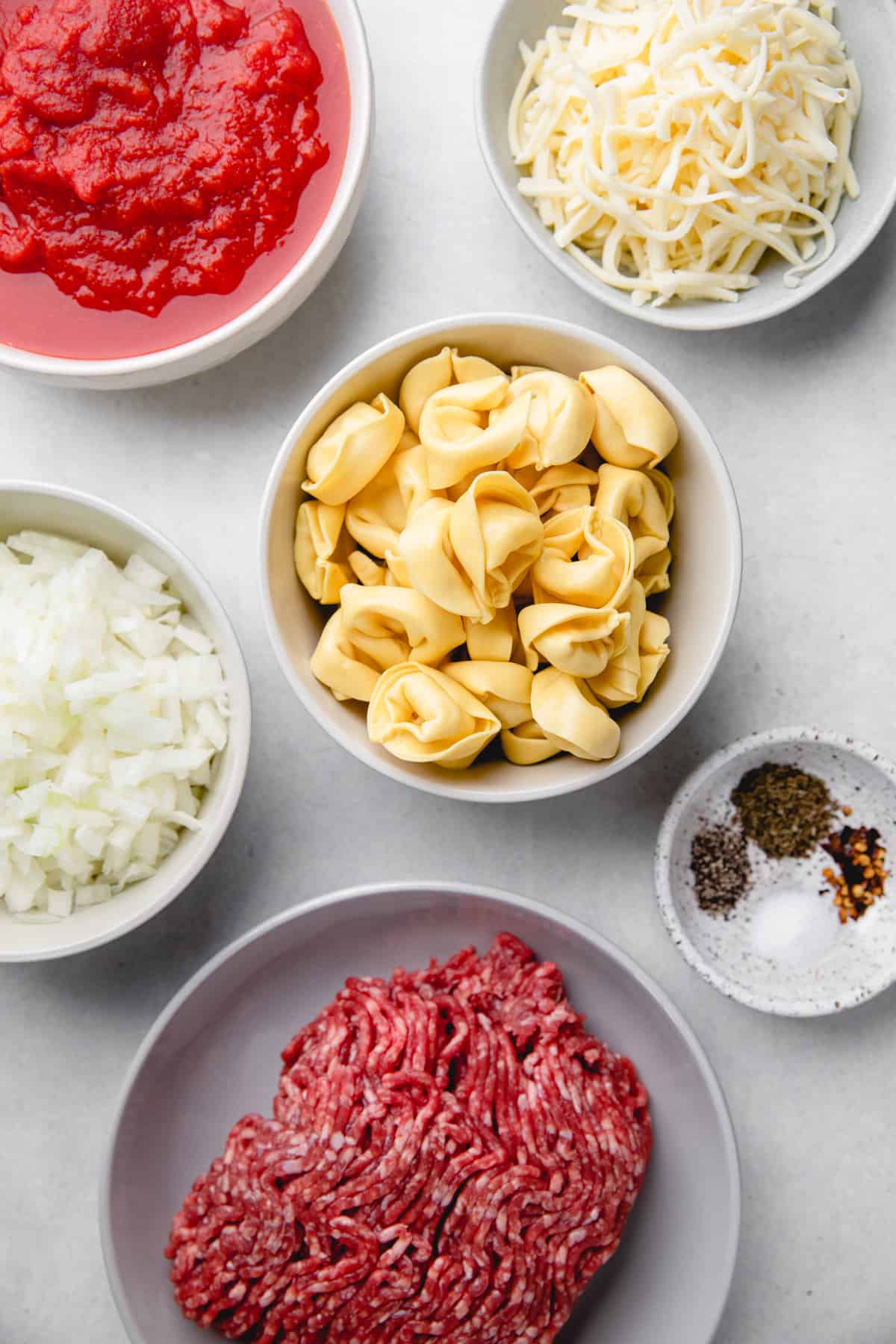 Ingredients to make Baked Tortellini with meat sauce.