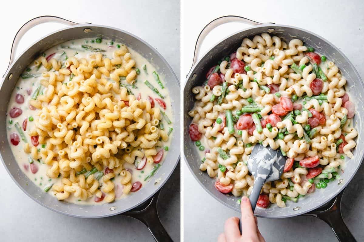 Adding cooked pasta to the creamy sauce with vegetables and mixing it together.