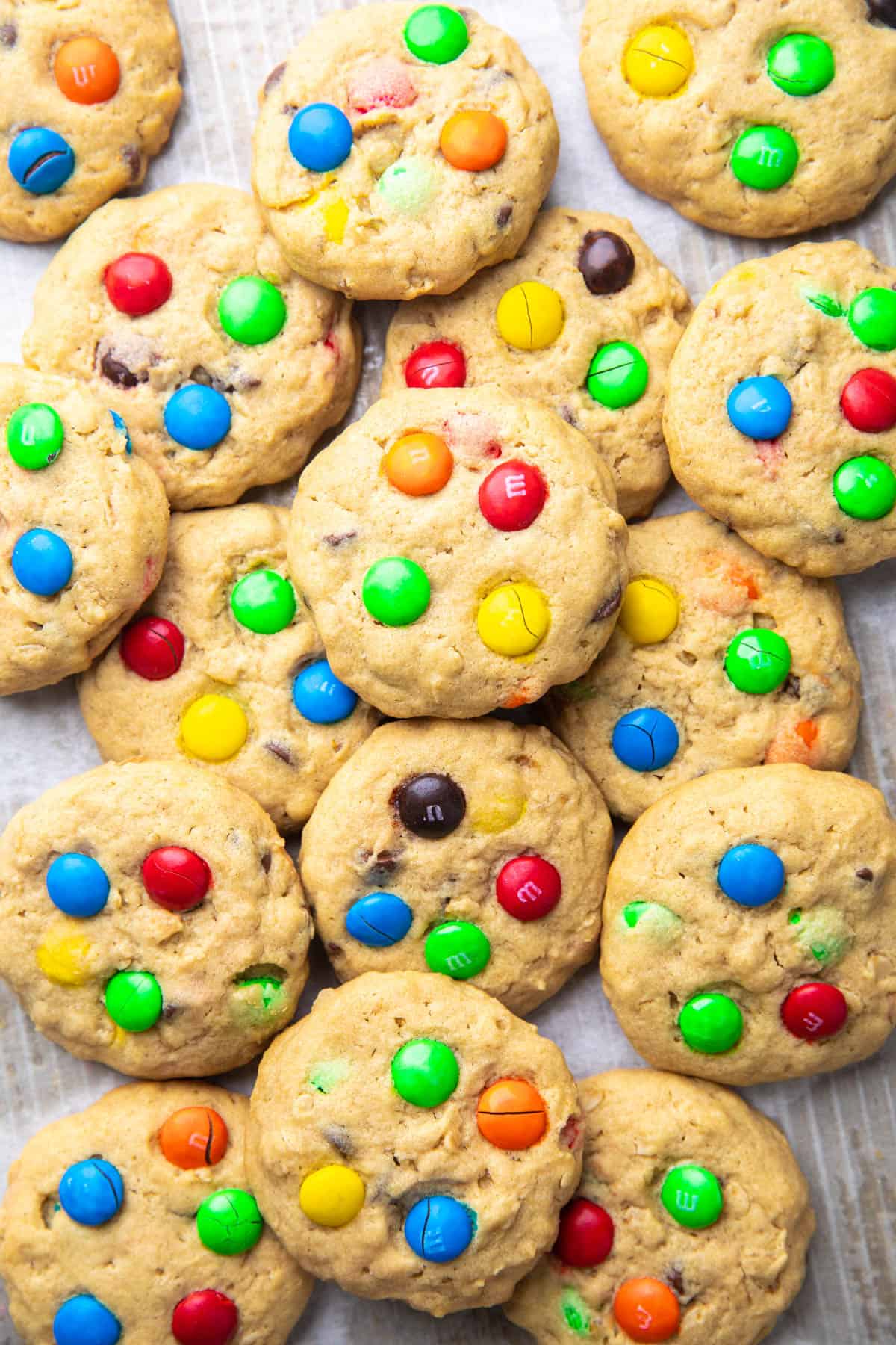 Cookies topped with M&Ms and chocolate chips.