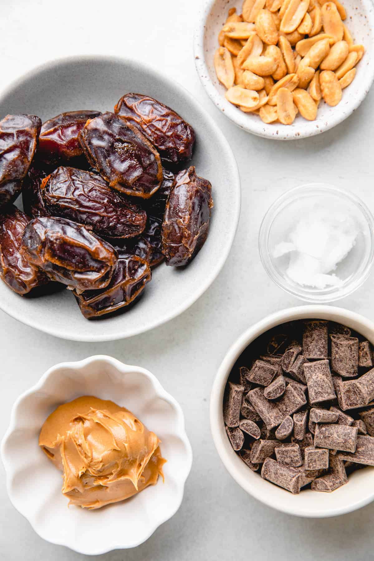 Separate ingredients to make chocolate covered dates.