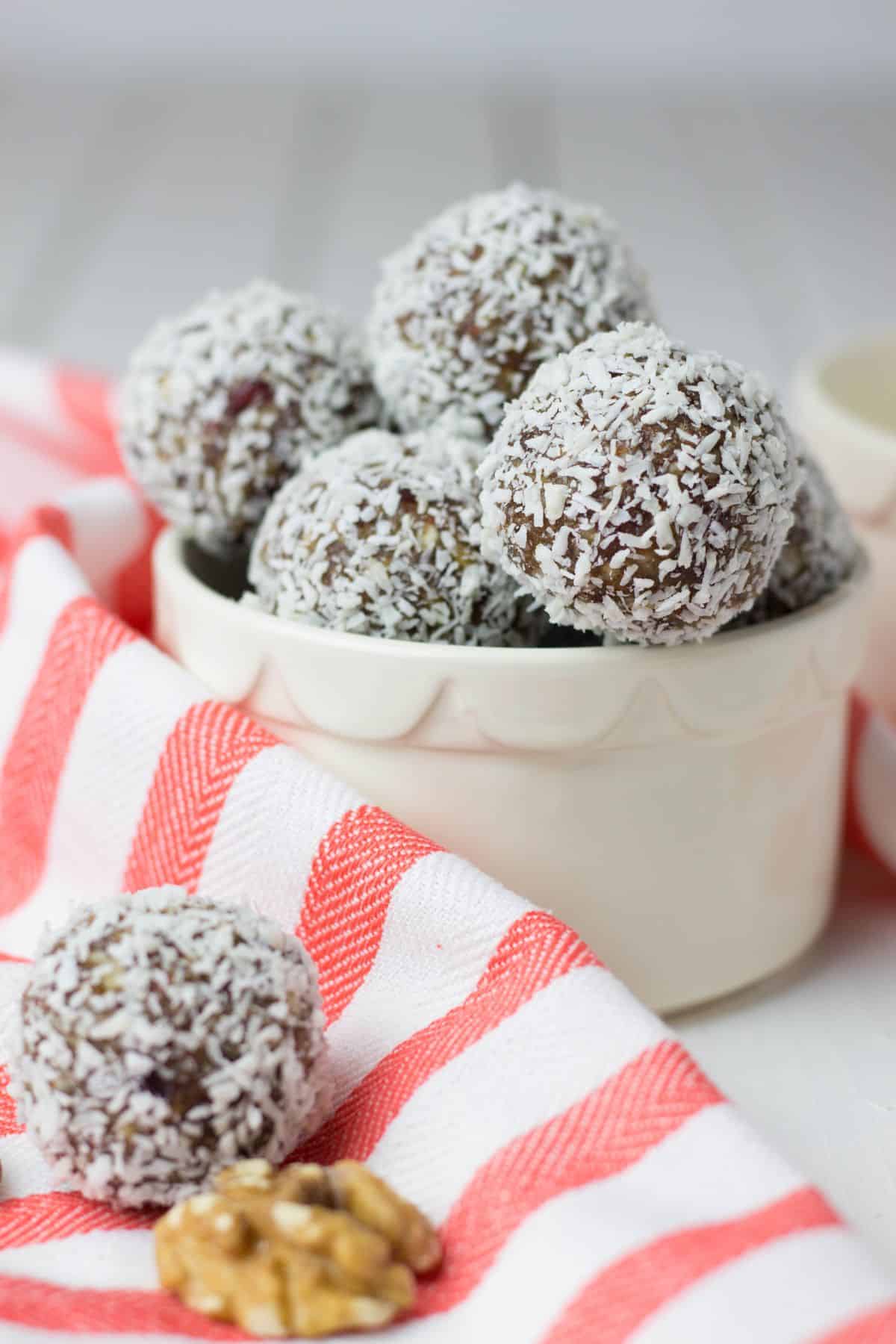 No Bake Energy Bites covered with shredded coconut.