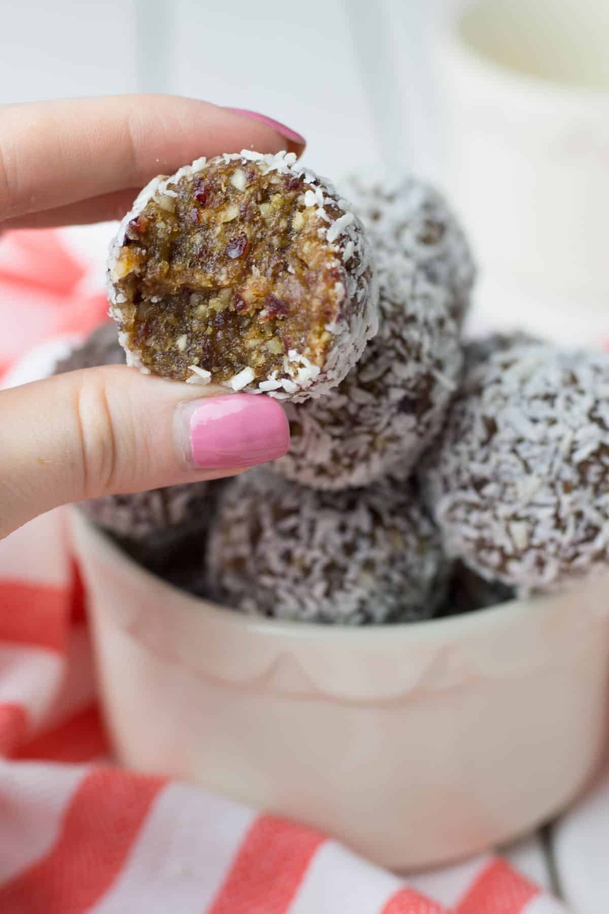 No Bake Energy Bites covered with shredded coconut.