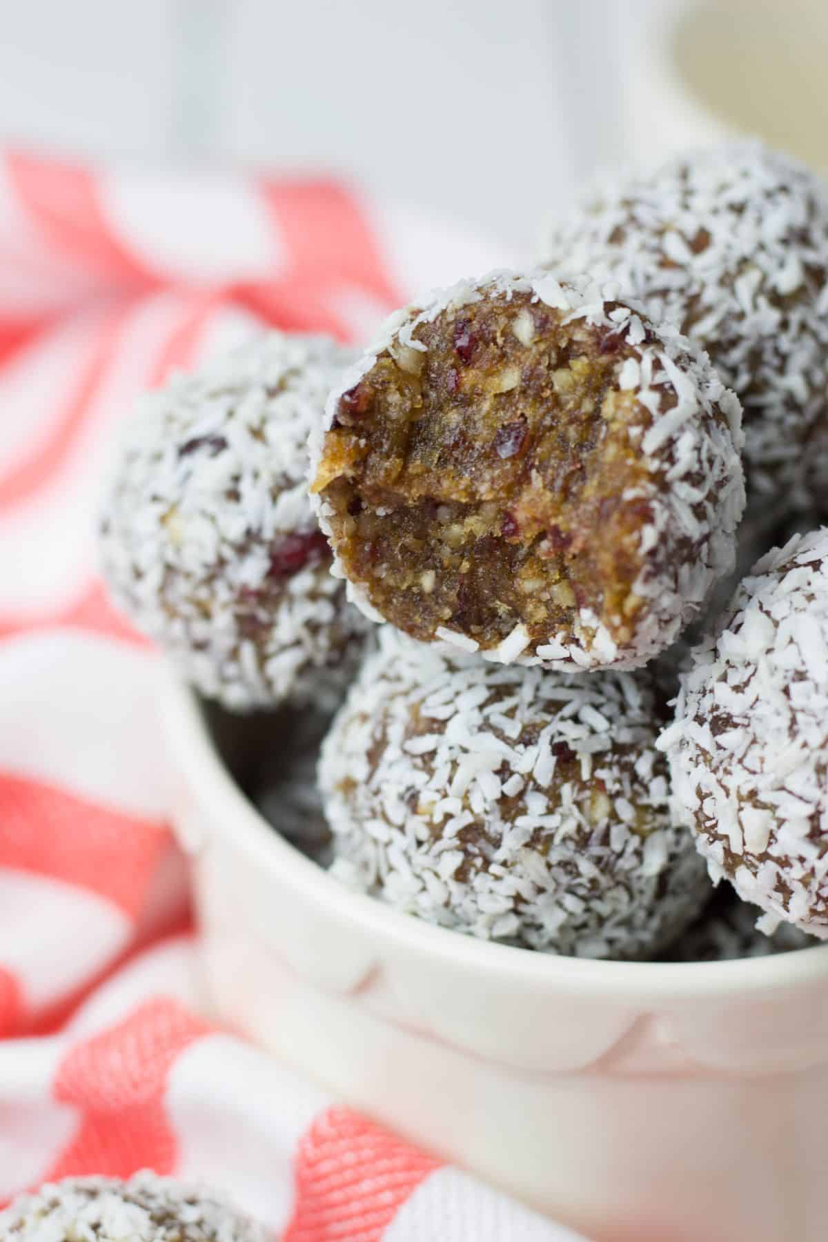 No Bake Energy Bites covered with shredded coconut.