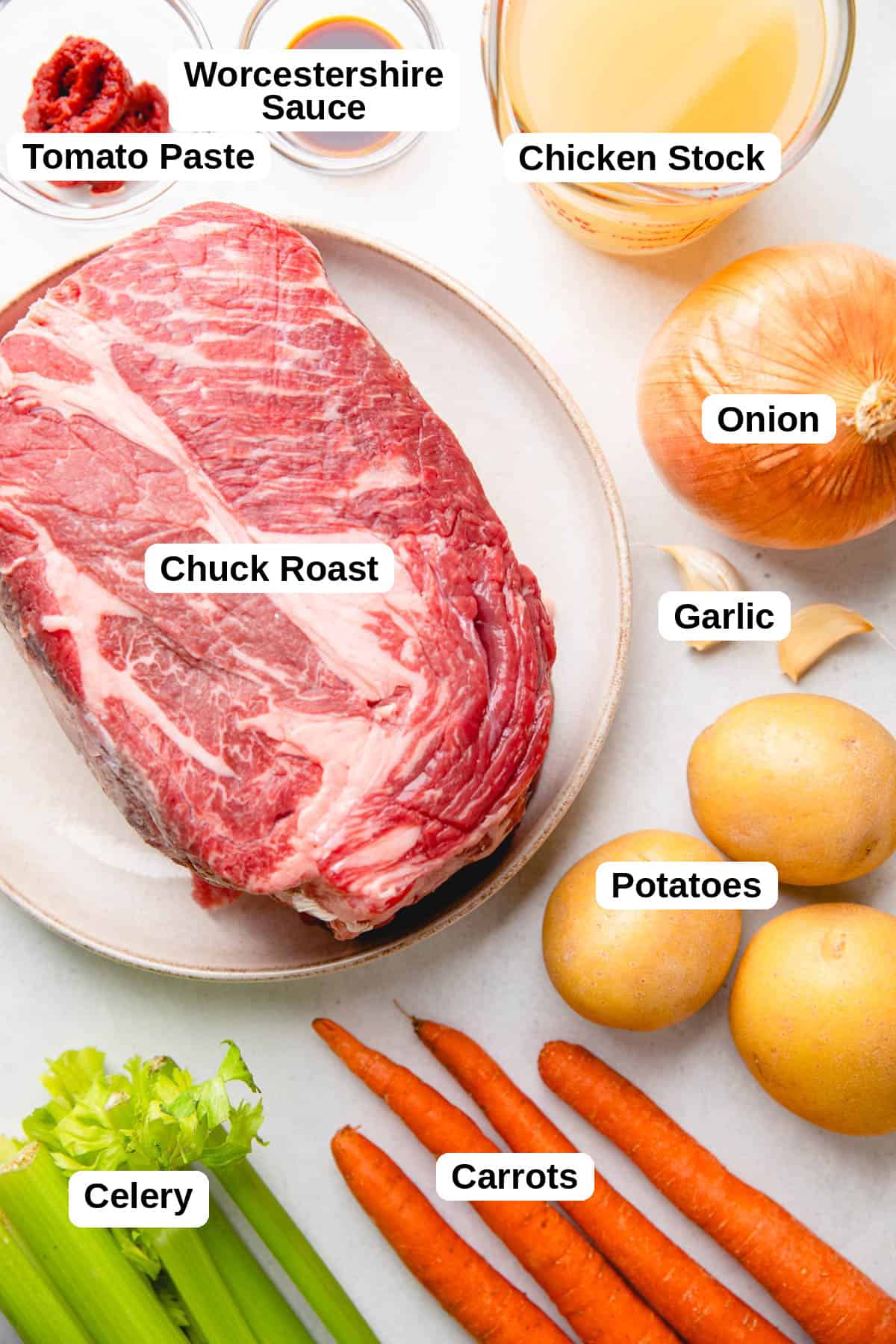 Ingredients to make pot roast with carrots and potatoes.