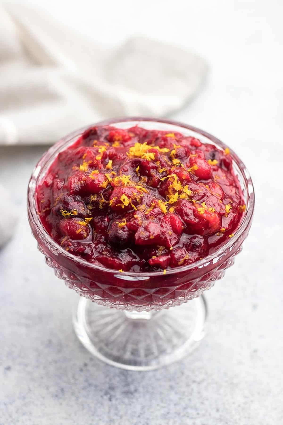Cranberry sauce in a glass bowl.