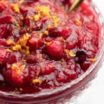 Cranberry sauce in a glass bowl.